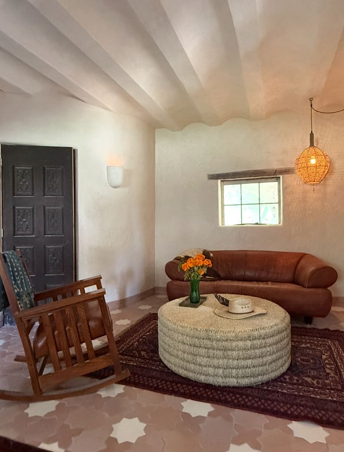 Lime plaster living room with vaulted beamed ceiling