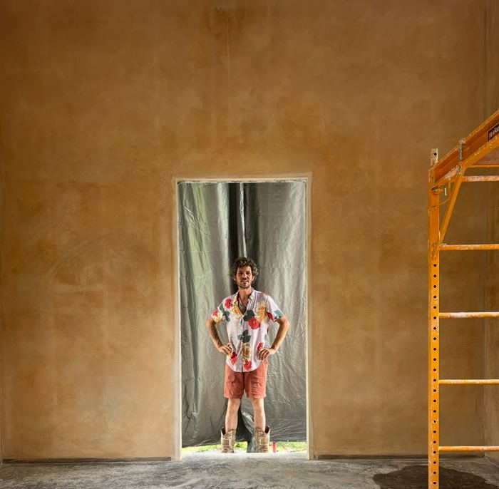 Finished lime plaster wall in progress