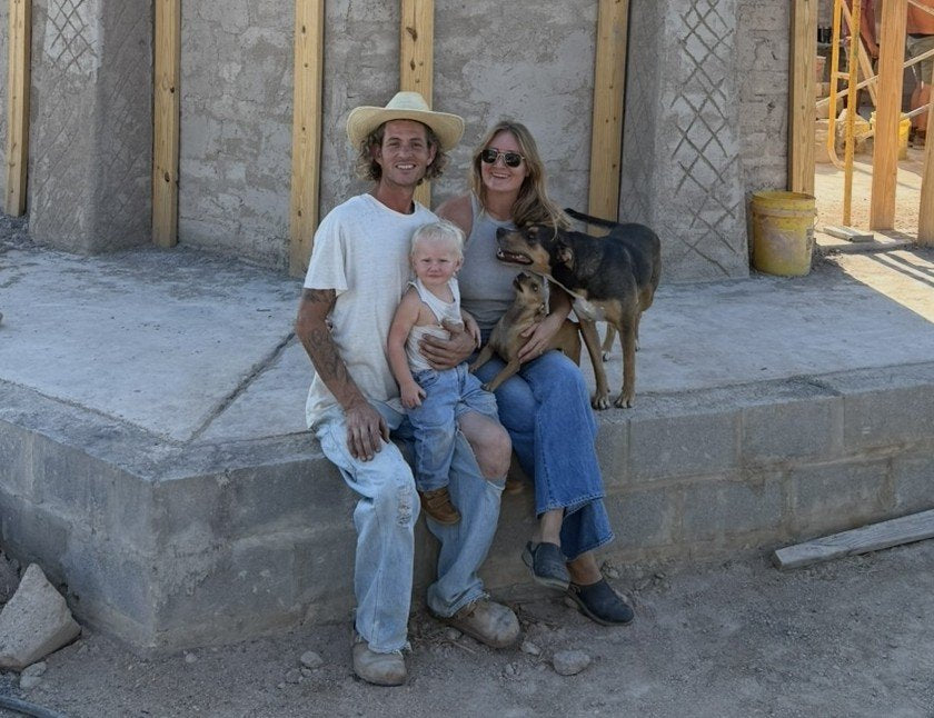 Simon and Arielle Gonzalez with their family on a job site