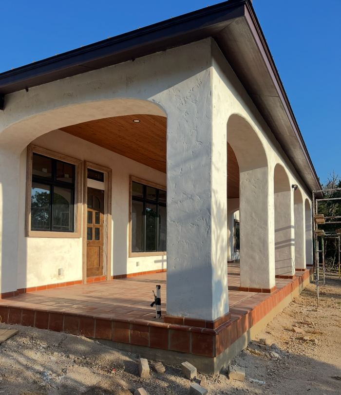 Arched lime plaster porch