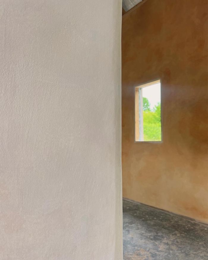 Lime plaster wall and window detail