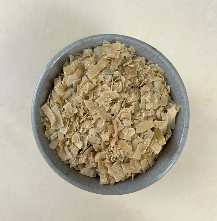 Bowl of grated Savon de Marseille olive oil soap flakes
